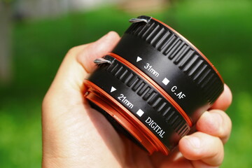 The macro rings of the dlf camera are made of black and red plastic