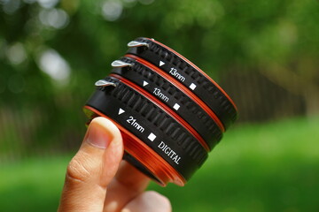 The macro rings of the dlf camera are made of black and red plastic