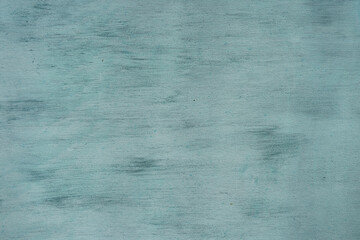 Painted in green old cracked metal rusted background. Metal texture. Erosion metal. Scratched and dirty texture on outdoor metal wall.