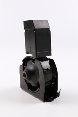 Engine rubber mounting for automobile isolated on white background