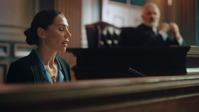 Court of Law and Justice: Portrait of Beautiful Female Victim Giving Heartfelt Testimony to Judge, Jury. Emotional Speech of Empowered Woman against Crime, Injustice, Prejudice, Corruption