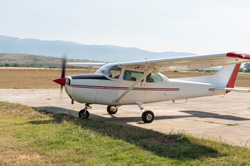 Old wing private airplane waiting for take off