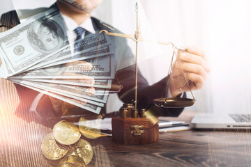 justice and law concept.Male judge in a courtroom on wooden table and Counselor or Male lawyer working in office. Legal law, advice and justice concept.