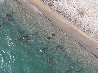 Aerial view of kanali beach crowded with tourists, famous tourist destination in preveza, epirus, greece