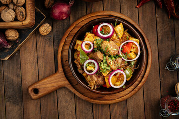 Georgian dish lamb ojahuri with potato stew in a bowl