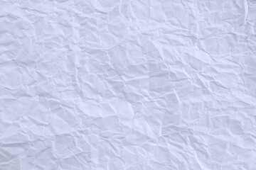 White crumpled paper texture background. crush paper so that it becomes creased and wrinkled.