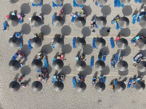 Aerial view of kanali beach crowded with tourists, famous tourist destination in preveza, epirus, greece