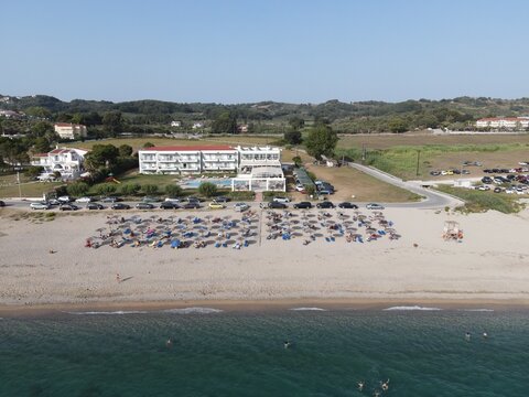 Aerial view of kanali beach crowded with tourists, famous tourist destination in preveza, epirus, greece