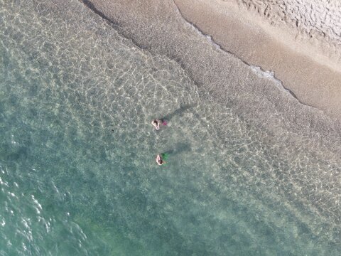 Aerial view of kanali beach crowded with tourists, famous tourist destination in preveza, epirus, greece