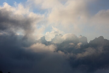 Fototapeta na wymiar The Dolomites cover by clouds