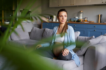 Pregnat woman relaxing at home before childbirth