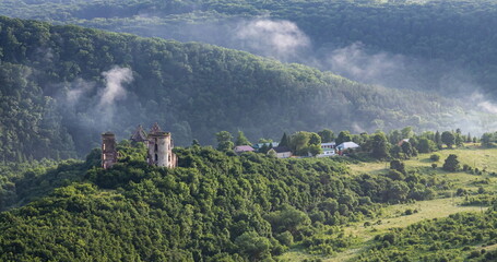 Fototapeta premium castle ruins on the background of the landscape of Ukraine Nyrkiv