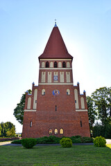 General view and architectural details of the Catholic Church of Our Lady Queen of Poland, built in 1894 in the Gothic style, in Pisanica in Masuria, Poland.