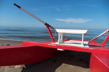 Rescue rowing catamaran on the sand