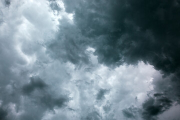 Dark ominous grey storm clouds. Dramatic sky.