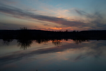 Obraz premium sunset over the river