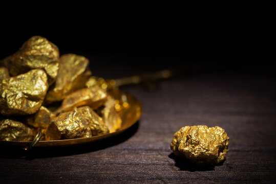 Gold concept, close-up of large gold nuggets