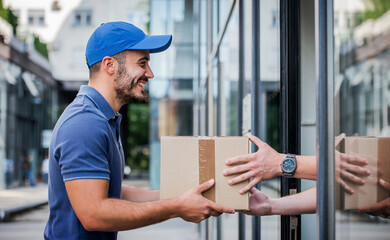 He never late. Delivery man with a package