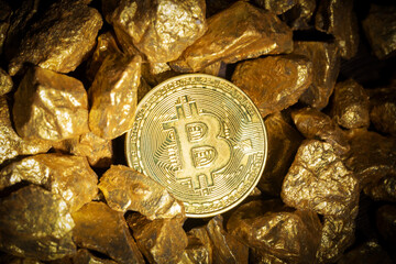 Close up of gold bullion and bitcoin, Concept of financial cryptocurrency