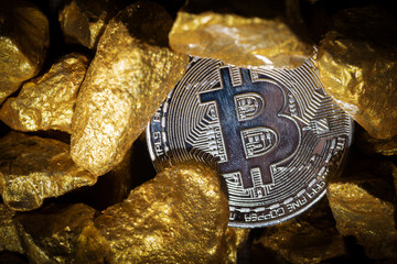 Close up of gold bullion and bitcoin, Concept of financial cryptocurrency