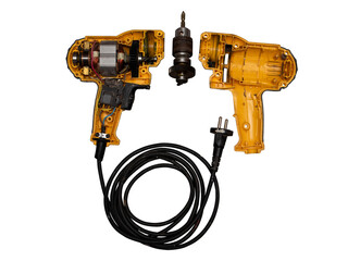 detachable used electric drill on white background The lid opens to reveal the internal components that include the motor, gear and switch.