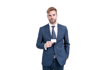businessman in businesslike suit showing empty credit or debit business card, copy space, business.