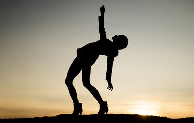 dark figure silhouette of dancing woman outdoor, inspiration