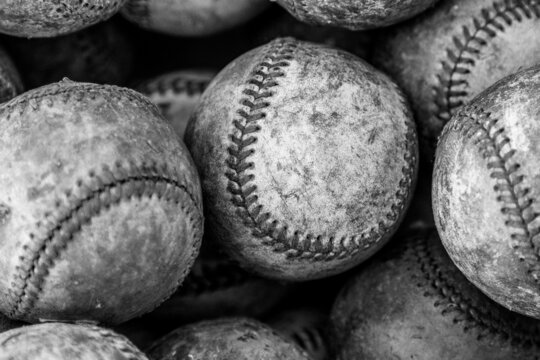 Fototapeta black and white photo of baseballs in a group