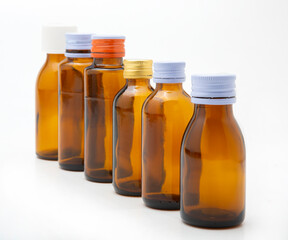 A brown bottle on a white background