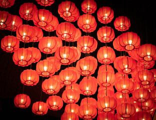 Red lanterns in the darkness, Japanese or Chinese lanterns. 