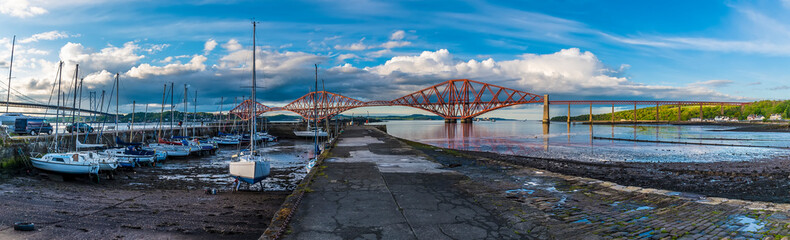A panorama view across the harbour and Firth of Forth in Queensferry, Scotland on a summers day