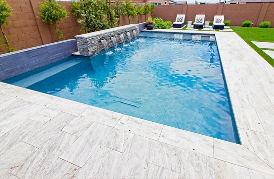 Outdoor Swimming Pool With Three Lounge Couches