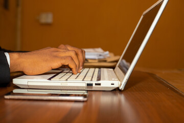 close up of businessman typing in the office