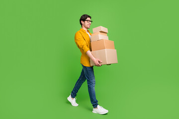 Full size profile side photo of young handsome positive man go walk moving new home isolated on...