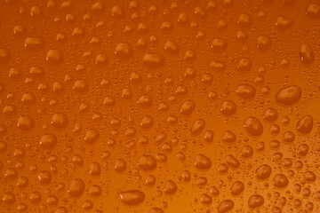Water Drops On Orange Background Texture colorful waterdrop.
