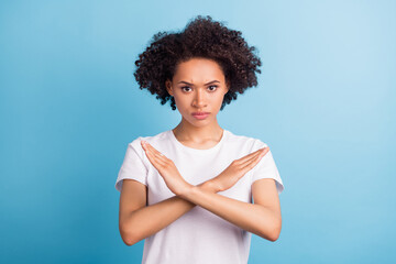 Portrait of young serious strict african pretty beautiful afro woman showing stop no gesture...