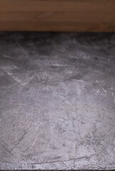Abstract painted  background texture as table top. Plaster or slate surface