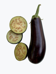 Fresh eggplant. Isolated eggplant. Whole eggplant and slices over white background