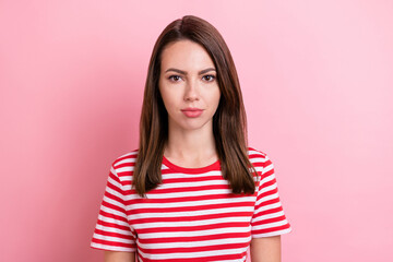 Fototapeta premium Photo of nice millennial brunette lady wear red t-shirt isolated on pink color background