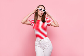 Photo of young pretty girl pouted lips hands touch eyeglasses wear casual outfit isolated over pastel color background