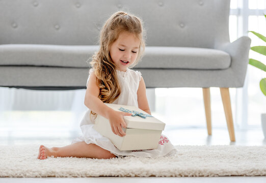 Child Girl With Gift Box