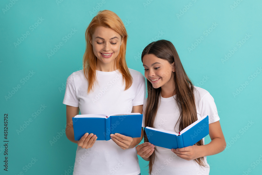 Wall mural smiling school pupil and student reding books, back to school