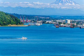 Naklejka premium Mountain Over Shipping Port
