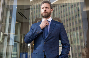 successful man in businesslike suit. entrepreneur outside the office. male formal fashion.