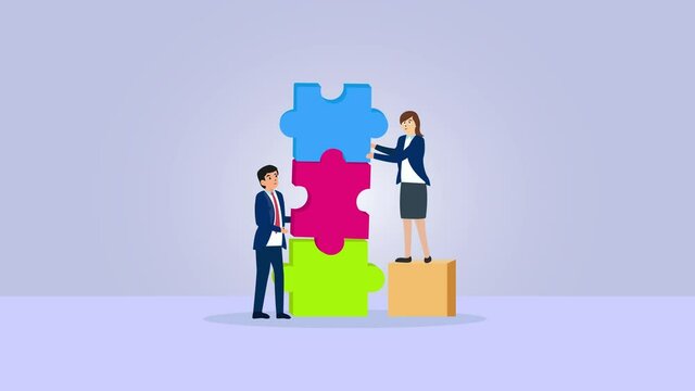 Two business people join puzzle pieces together