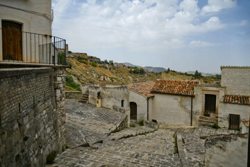 Obraz premium A street in the historic center of Aliano, a old town in the Basilicata region, Italy.