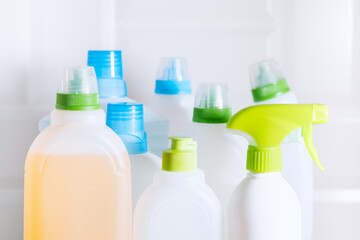 House cleaning products pile on white background. Cleaning concept, cleaning supplies.