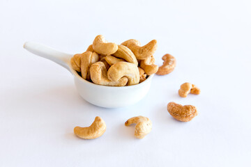 Cashew nut on white background. Healthy grains.