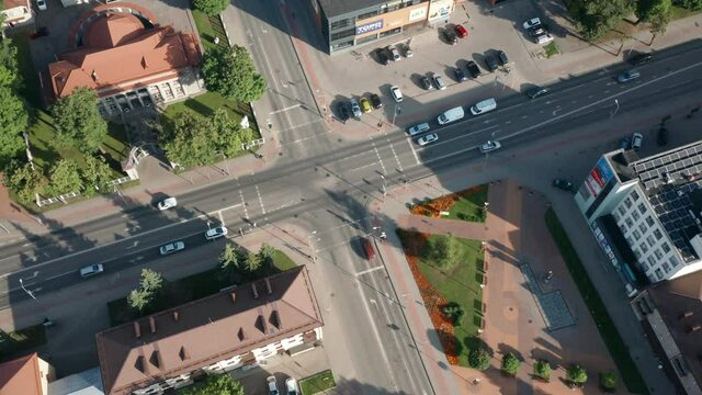 Town street intersection, pedestrian crossing, aerial hyperlapse