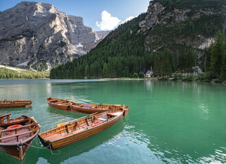 Fototapeta premium Beautiful view of Braies Lake, Trentino-Alto Adige, Italy with boats